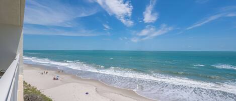 On the beach, sun-loungers, beach towels