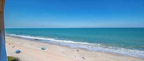 On the beach, sun loungers, beach towels