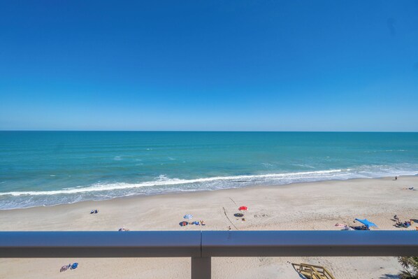 On the beach, sun-loungers, beach towels
