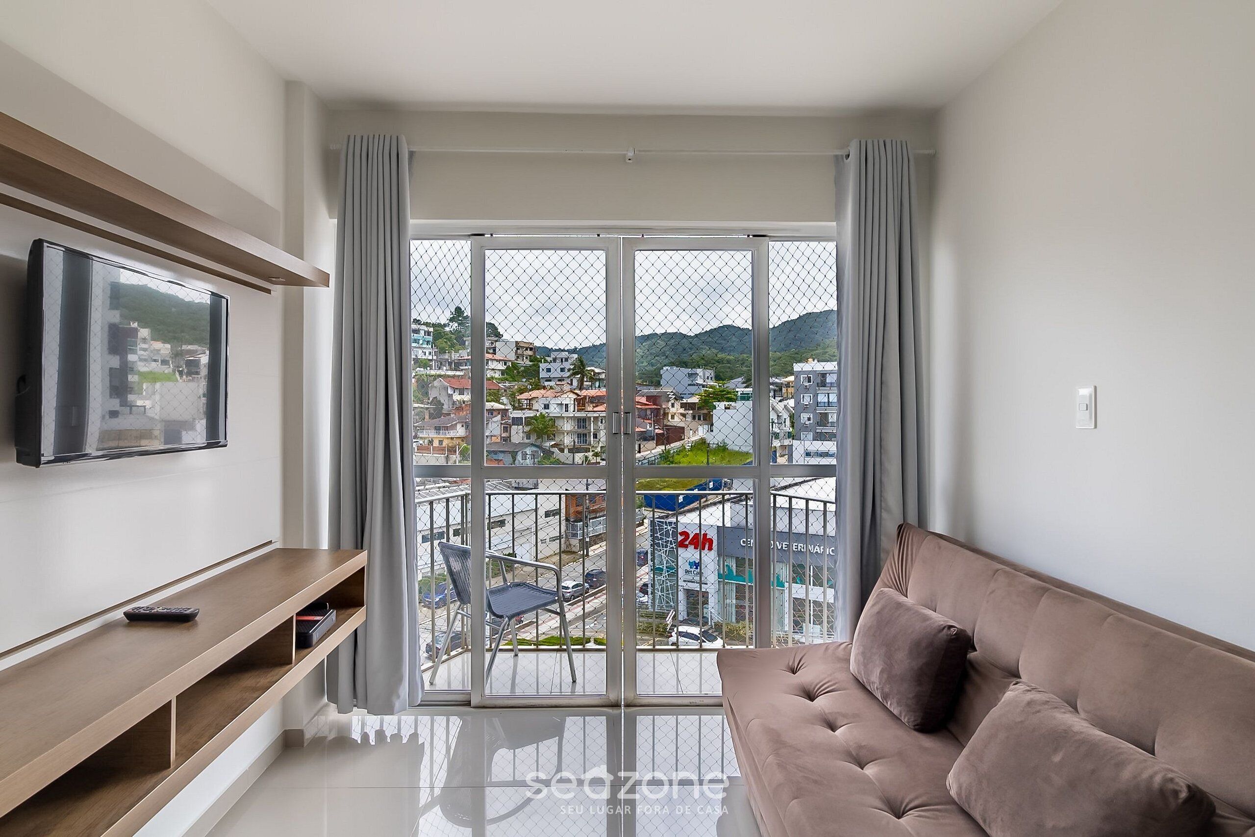 Basic Apartment | Living area | TV