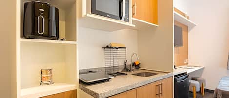 Microwave, coffee/tea maker, cookware/dishes/utensils