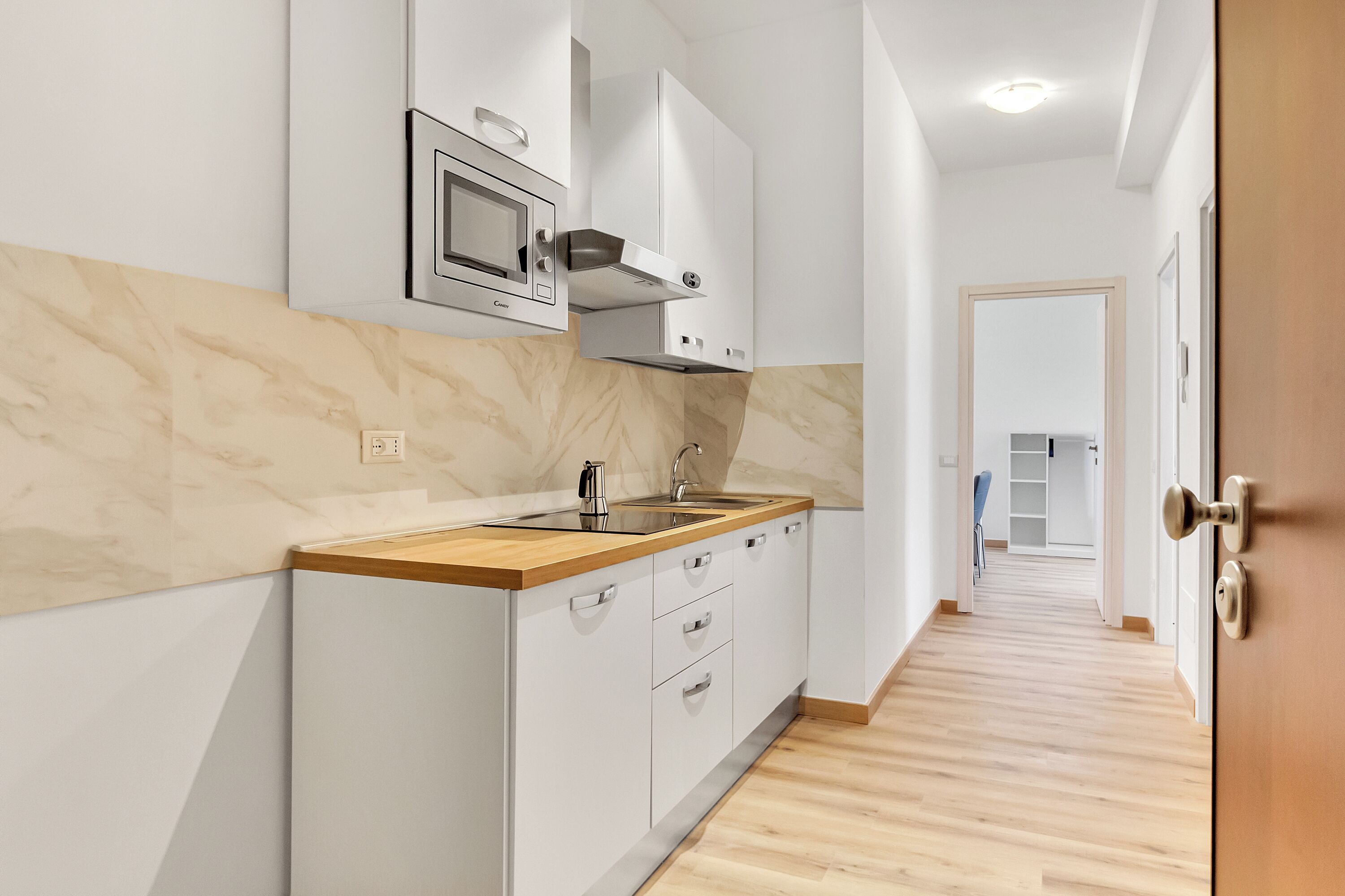 Classic Apartment | Private kitchen | Mini-fridge, microwave, stovetop, cookware/dishes/utensils