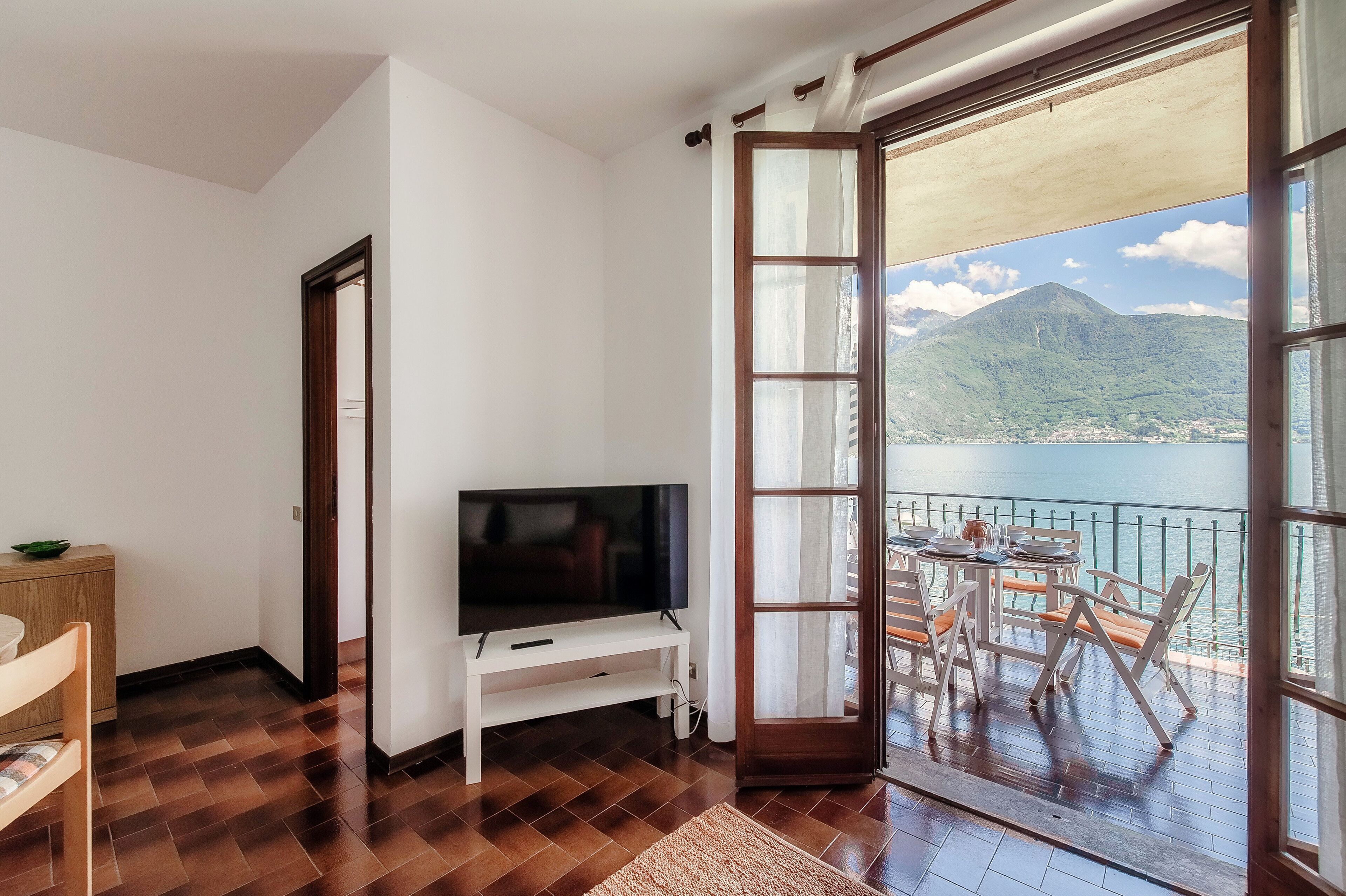 Apartment, Lake View | Living room | 30-inch TV with digital channels