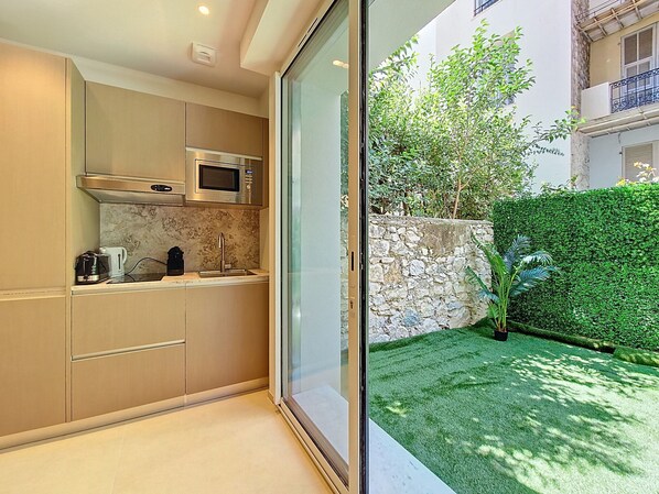 Fridge, microwave, coffee/tea maker, electric kettle