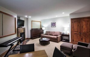 Smart TV, fireplace, DVD player, books