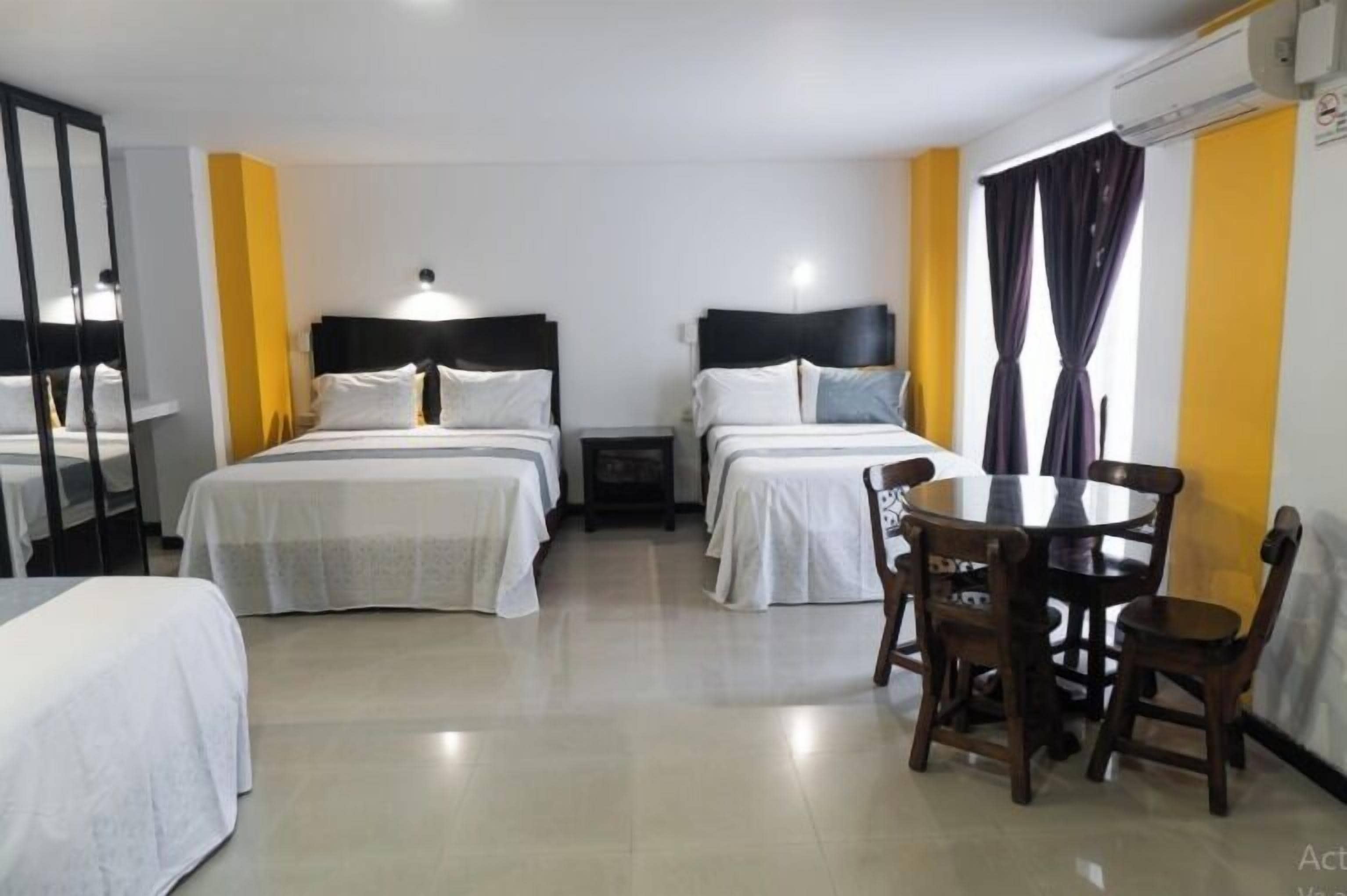 Junior Quadruple Room | In-room safe, iron/ironing board, free WiFi