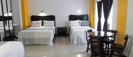 Junior Quadruple Room | In-room safe, iron/ironing board, free WiFi