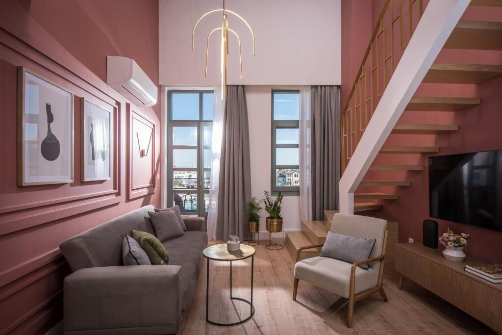 Deluxe Condo, Balcony, Sea View | Living area | TV