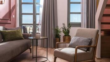 Deluxe Condo, Balcony, Sea View | Living area | TV