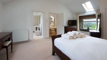 1 bedroom, desk, iron/ironing board, travel crib