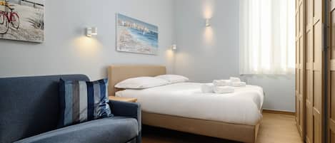 1 habitación, tabla de planchar con plancha, wifi y ropa de cama