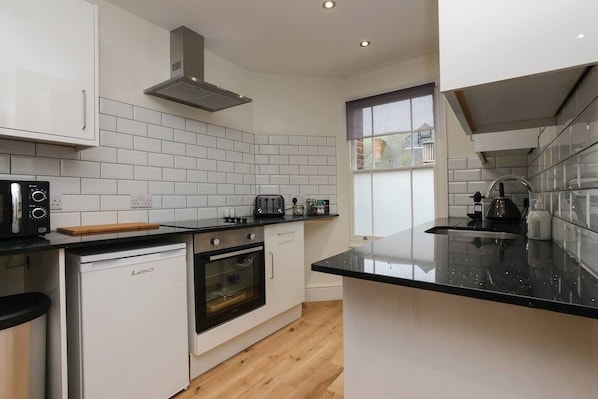 Appartement | Cuisine privée | Four, plaque de cuisson
