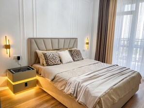 2 chambres, fer et planche à repasser, Wi-Fi, draps fournis