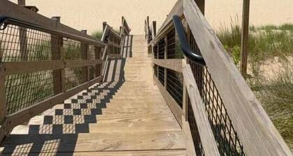 5 min Walk to Beach • Foosball • Sleeps 9