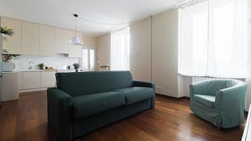 Departamento (1 Bedroom) | Área de sala de estar | Televisión