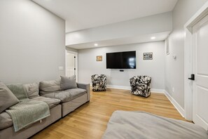 Smart TV, fireplace, books