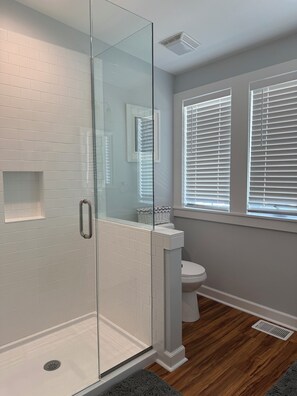 Shower, towels, soap, toilet paper