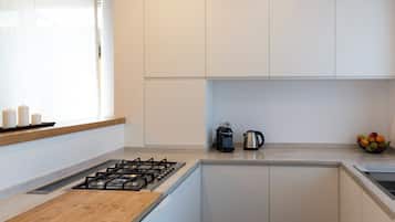 Comfort Apartment | Private kitchen | Full-size fridge, oven, stovetop, dishwasher