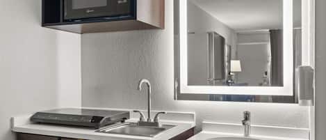 Hair dryer, towels, soap, shampoo