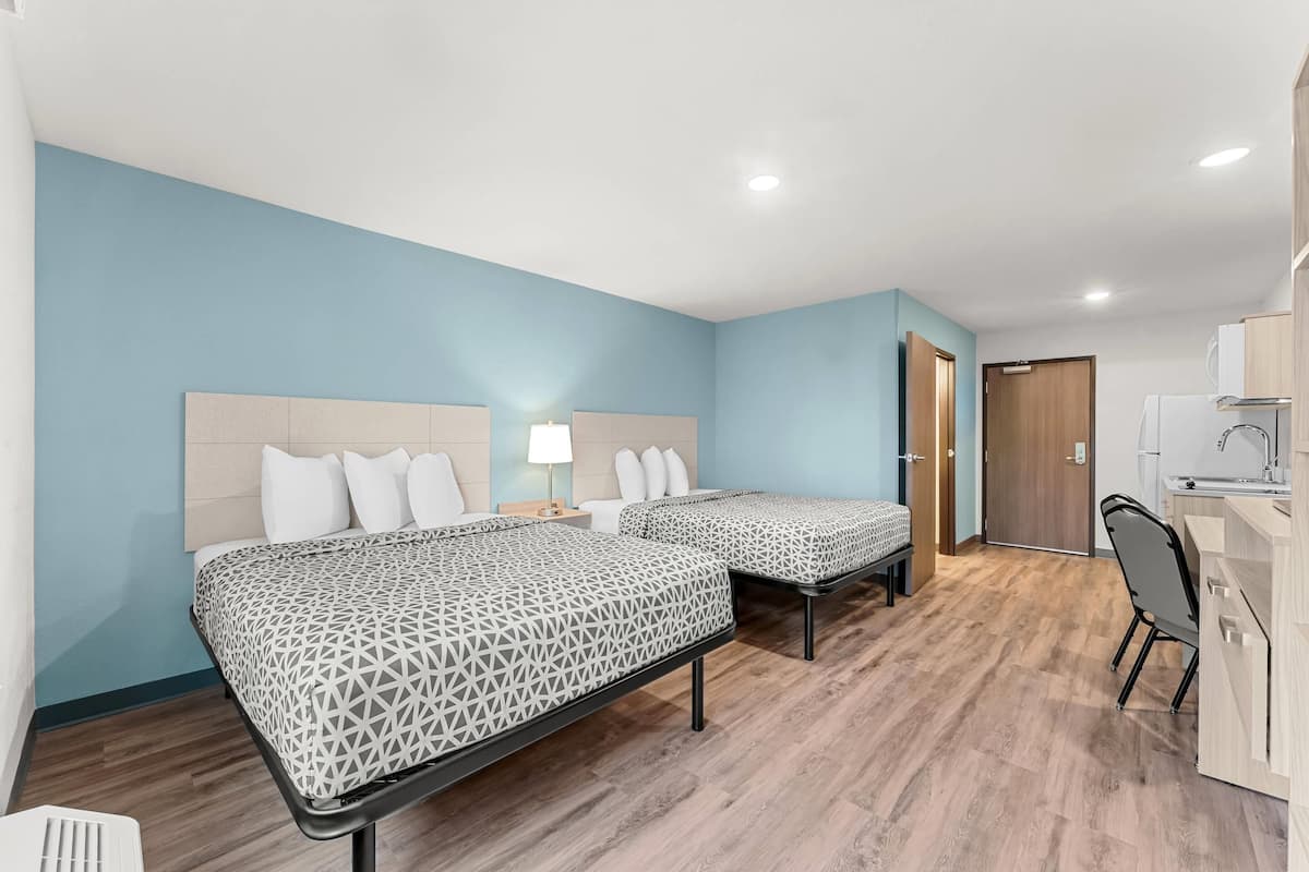 Suite, 2 queensize bedden, niet-roken | Gratis wifi, beddengoed