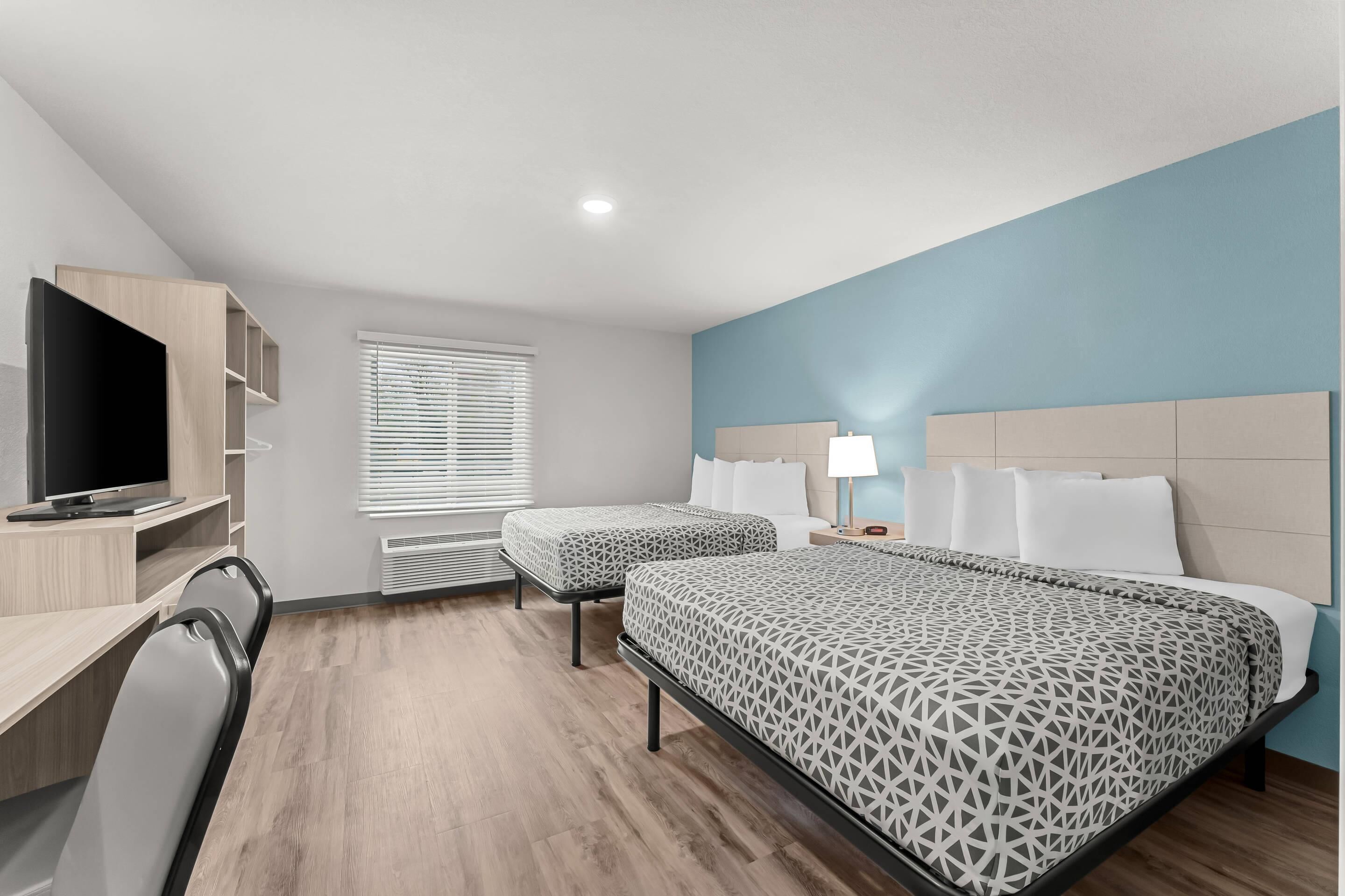Suite, 2 queensize bedden, niet-roken | Een bureau, gratis wifi, beddengoed