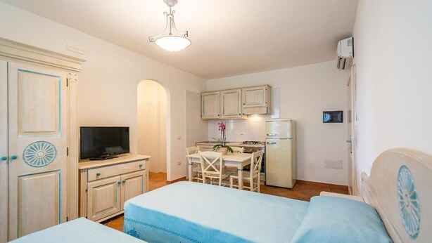 Room amenity - Charming Baia Marina Apartments With Stunning View 1 Bedroom Apartment Sleeps 4 (Orosei)