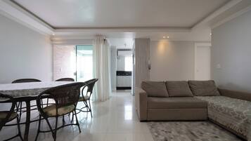 Basic Apartment | Living area | 32-inch Smart TV with digital channels