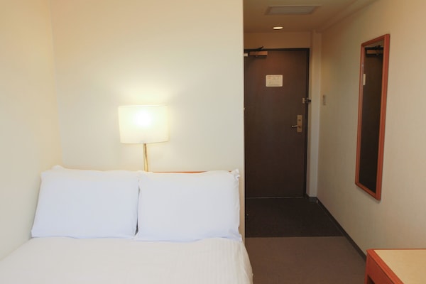 Down comforters, desk, free WiFi, bed sheets