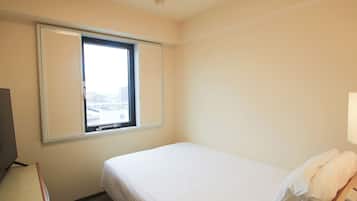 Donzen dekbedden, een bureau, gratis wifi, beddengoed