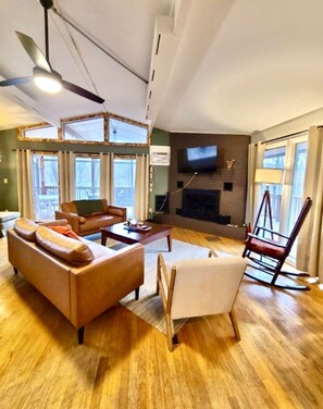 TV, fireplace, books, offices