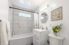 Hair dryer, towels, soap, toilet paper