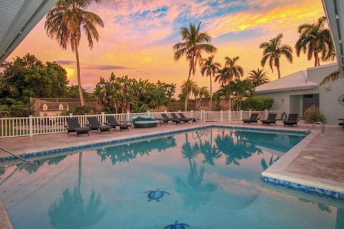 STUNNING 7-bedroom house with separate guest house, pool and tennis courts.