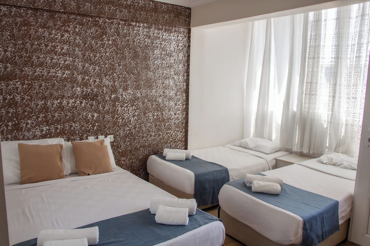 Standard Triple Room, City View | Iron/ironing board, free WiFi