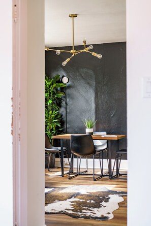 Jungle Beat | Living area | 55-inch Smart TV with digital channels, Netflix, Hulu - Jungle House Historic Lofts – German Village (Columbus)