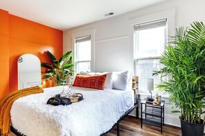 Bathtub, eco-friendly toiletries, hair dryer, towels