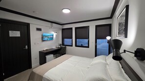 1 habitación, acceso a internet y ropa de cama