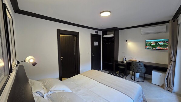 1 habitación, acceso a internet y ropa de cama