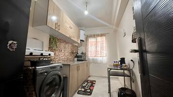 Fridge, oven, coffee/tea maker, toaster