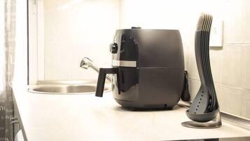 Fridge, microwave, oven, cookware/dishes/utensils