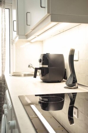 Fridge, microwave, oven, cookware/dishes/utensils