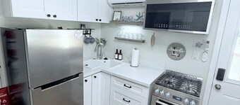 Modern Suite • Kitchen • Fireplace • Private Entry