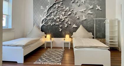 Space for a group, family & pets in a vacation apartment near the lake & garden