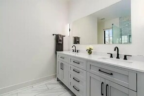 Eco-friendly toiletries, hair dryer, soap, shampoo
