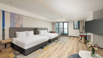 Premium bedding, down duvets, desk, laptop workspace