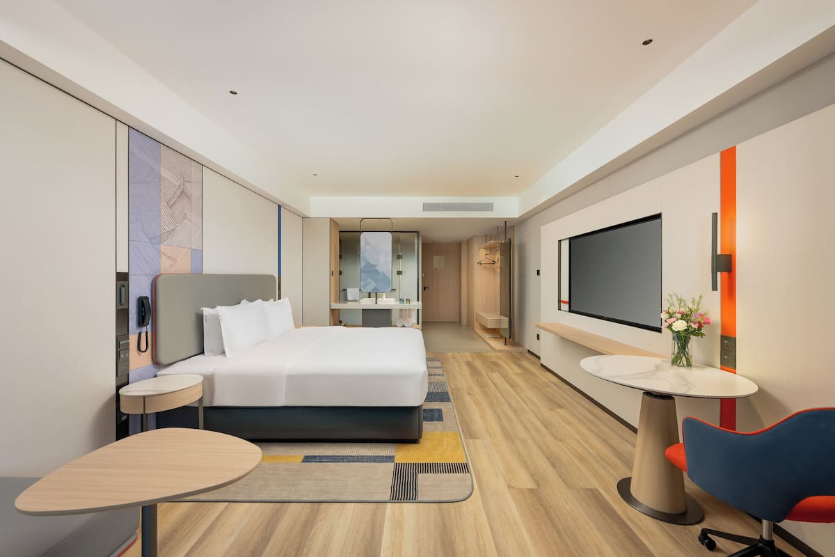 Premium bedding, down comforters, desk, laptop workspace