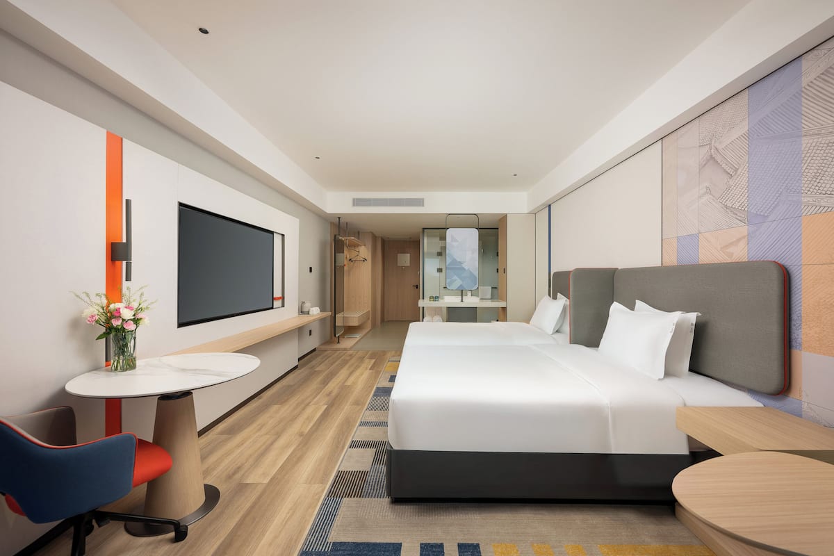 Premium bedding, down comforters, desk, laptop workspace