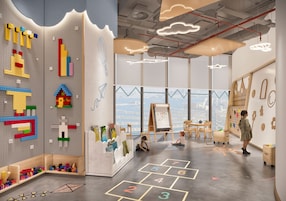 A modern children's playroom with LEGO walls, a large window view, and a chalkboard.