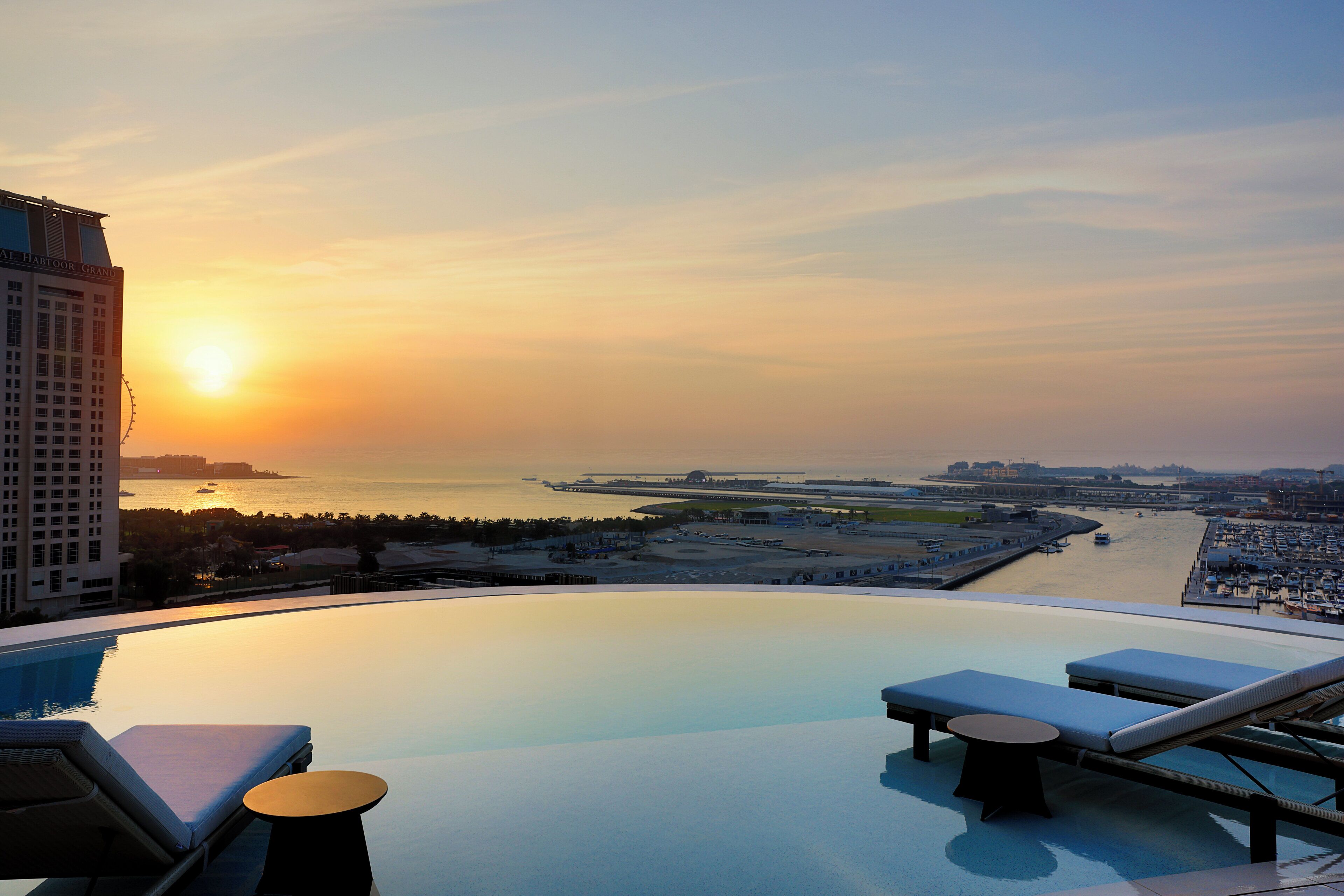 2 outdoor pools, open 7:00 AM to 8:00 PM, pool loungers