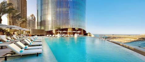 3 outdoor pools, open 7:00 AM to 7:00 PM, pool loungers