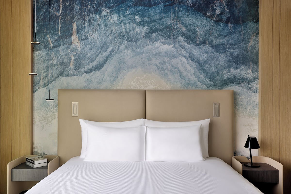Premium bedding, down duvets, minibar, in-room safe